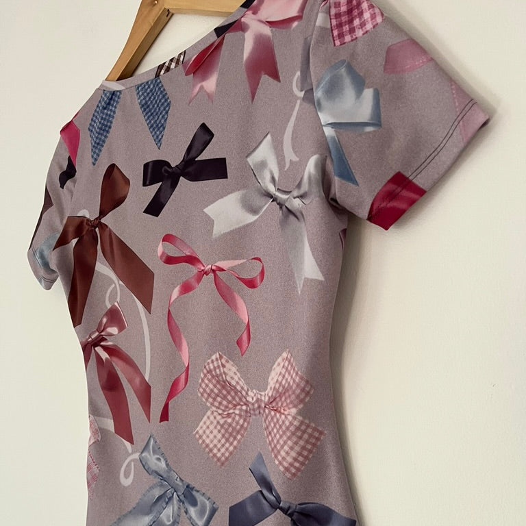 Lucinda Babi BOWS Mesh Baby Tee.