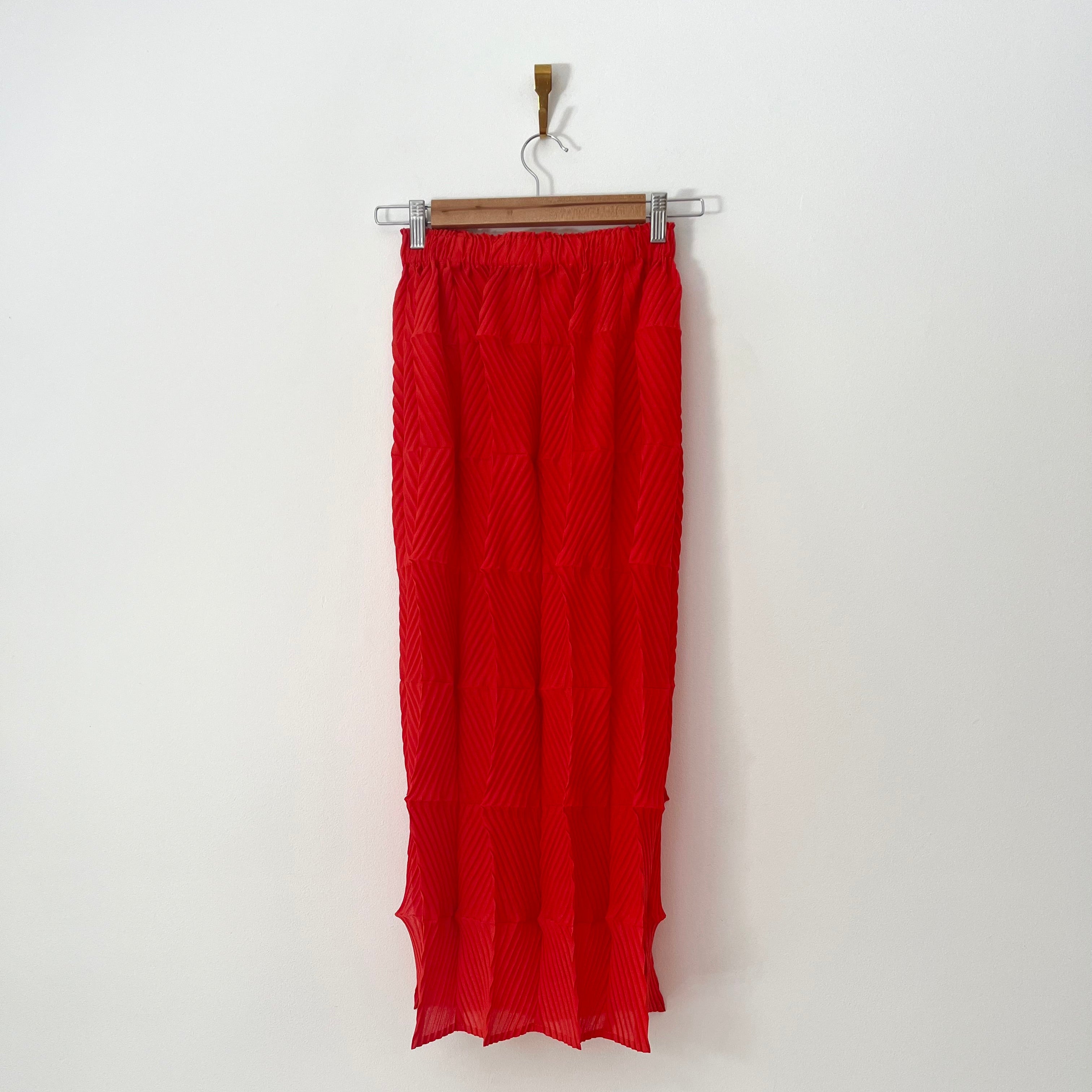 Alpha60 Pleated Midi Skirt in Red.