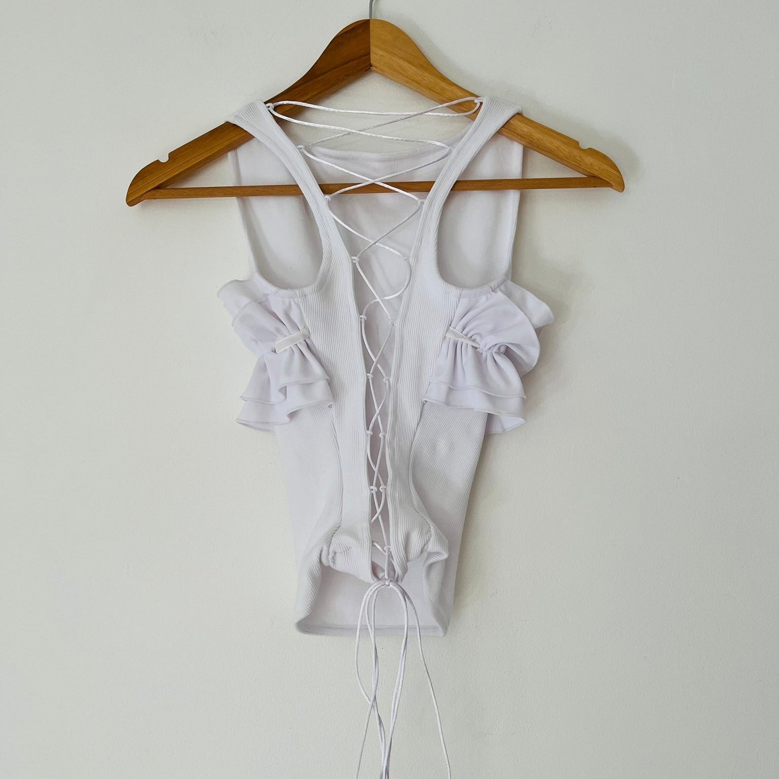 Bye Bambi YURAH Singlet in White.