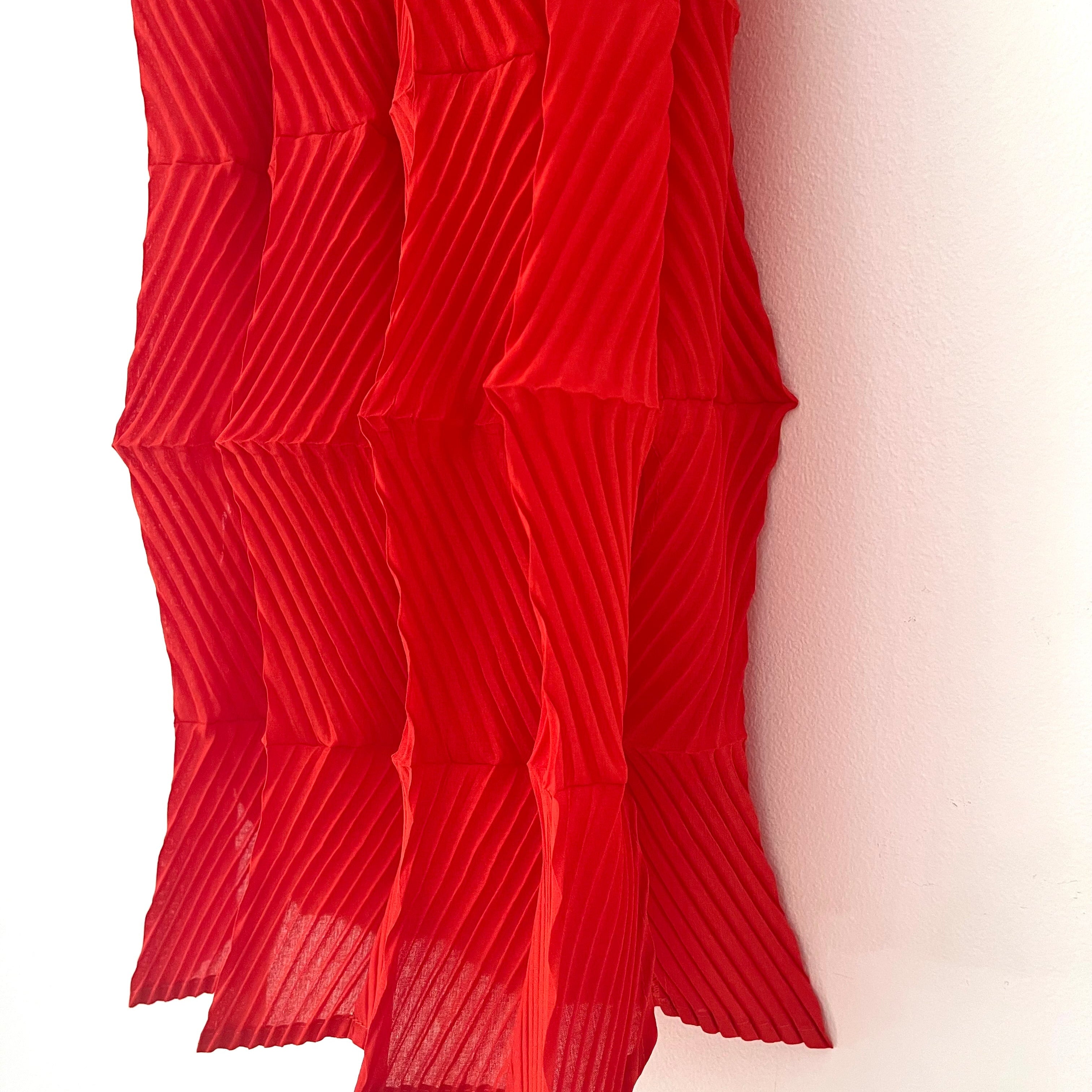 Alpha60 Pleated Midi Skirt in Red.