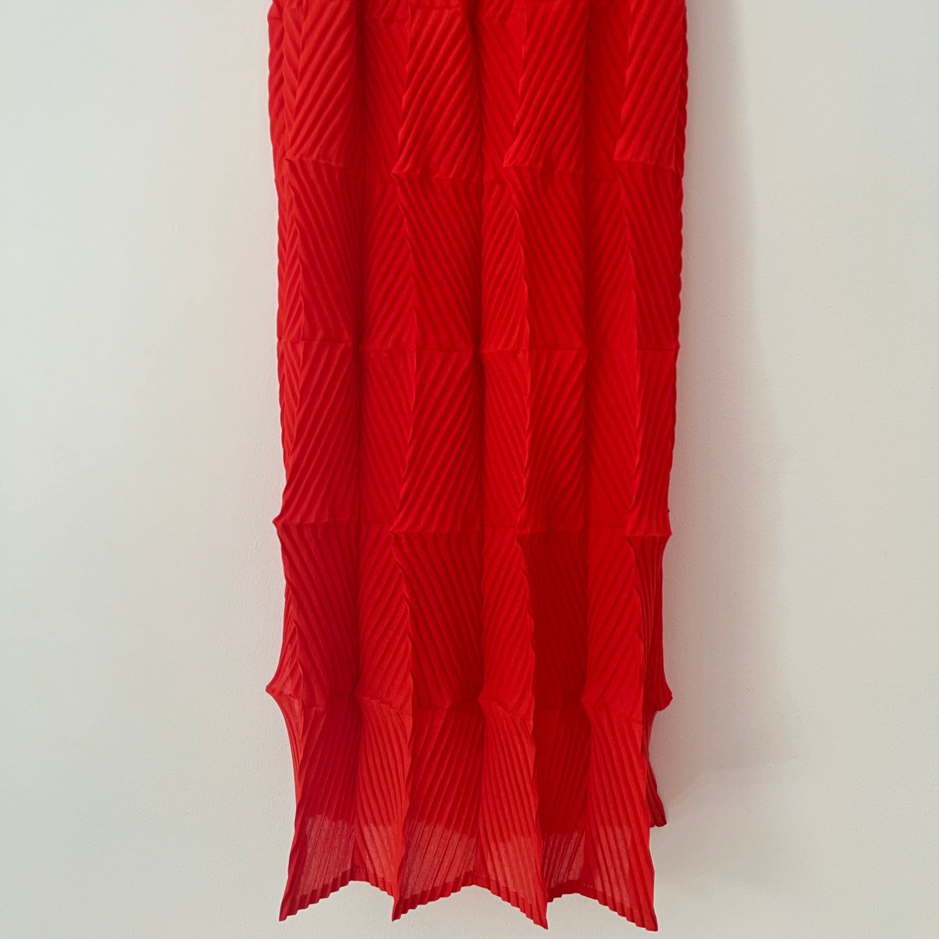 Alpha60 Pleated Midi Skirt in Red.