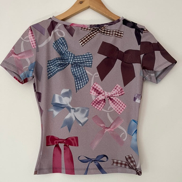 Lucinda Babi BOWS Mesh Baby Tee.