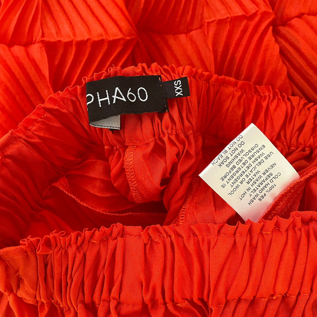 Alpha60 Pleated Midi Skirt in Red.