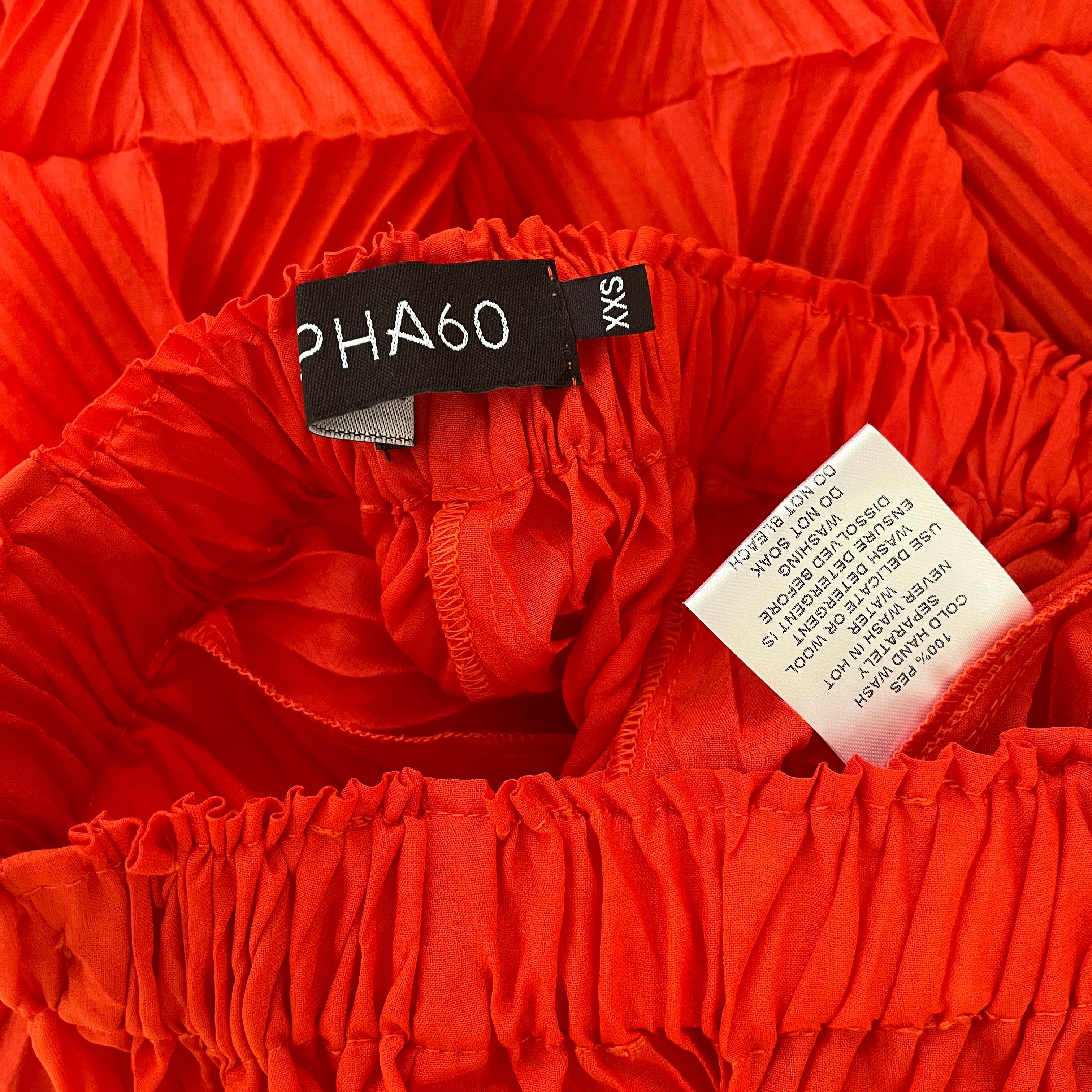 Alpha60 Pleated Midi Skirt in Red.