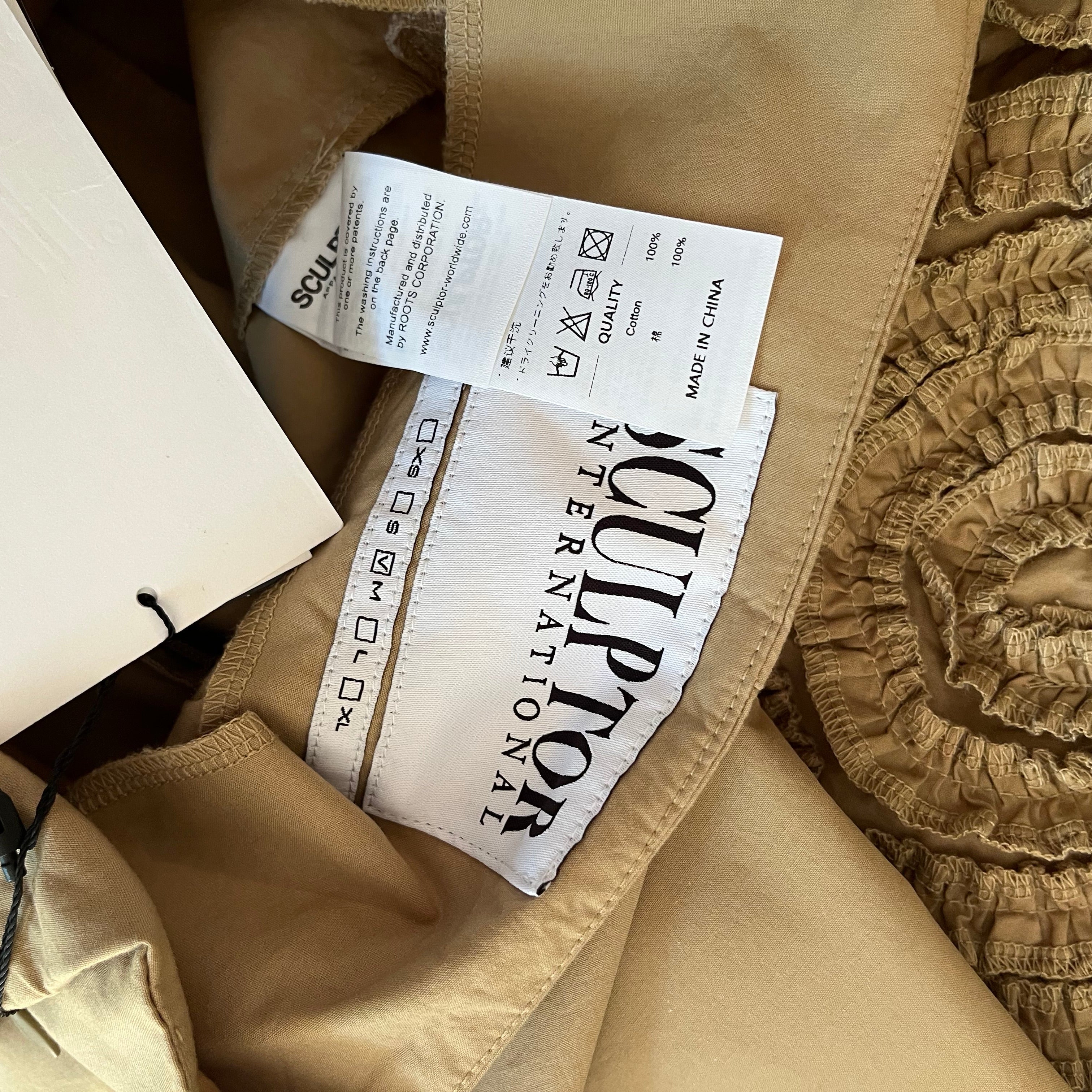 Sculptor BNWT Ruffle Trim Midi Skirt in Beige Size M.