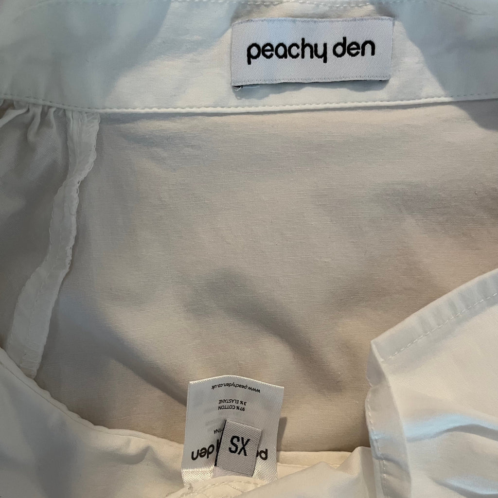 Peachy Den MISSY Asymmetric Blouse in Porcelain Size XS.