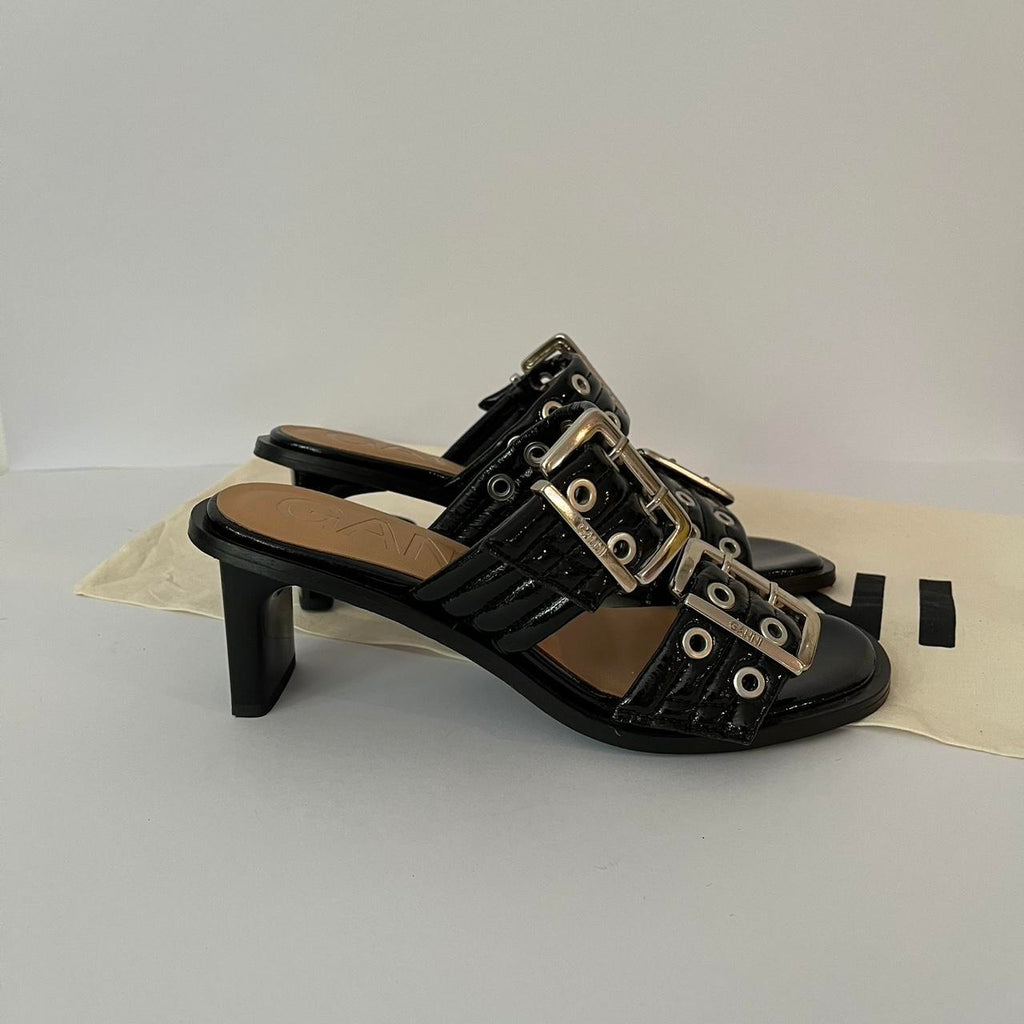 Ganni Leather Buckle Heels in Black.