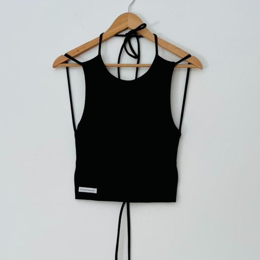 With Consideration Backless Tie Top in Black.