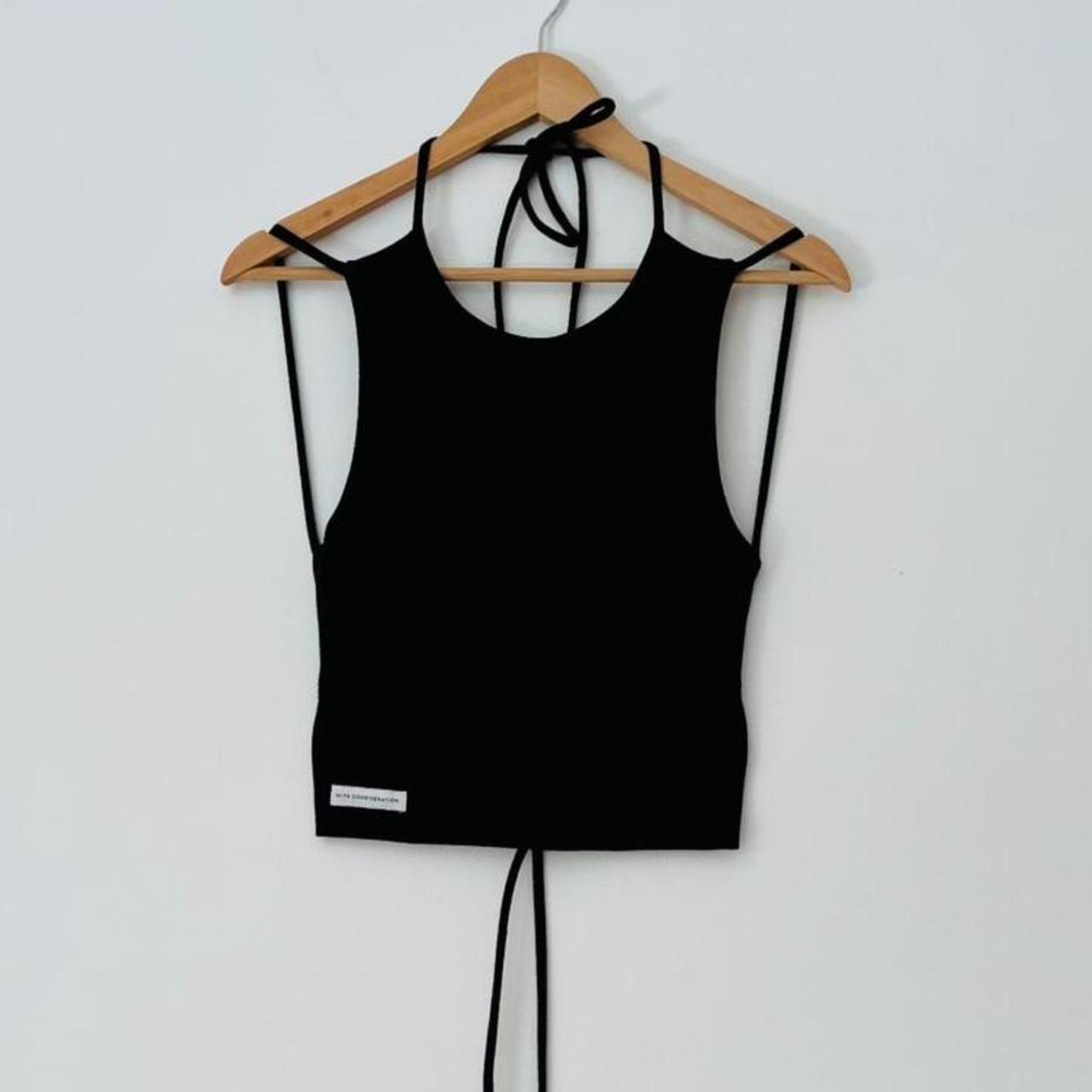 With Consideration Backless Tie Top in Black.