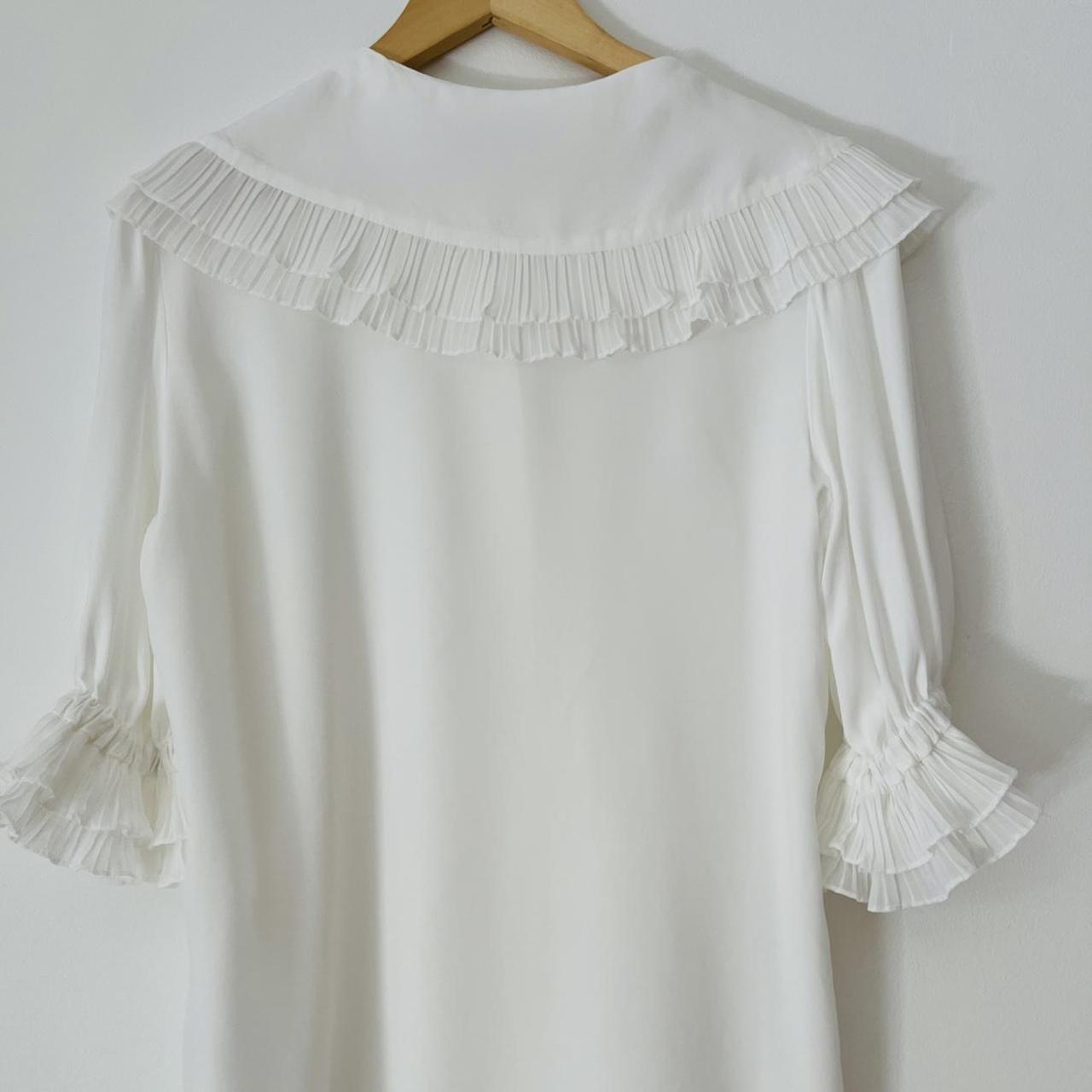 Avavav Ruffle Blouse in White.