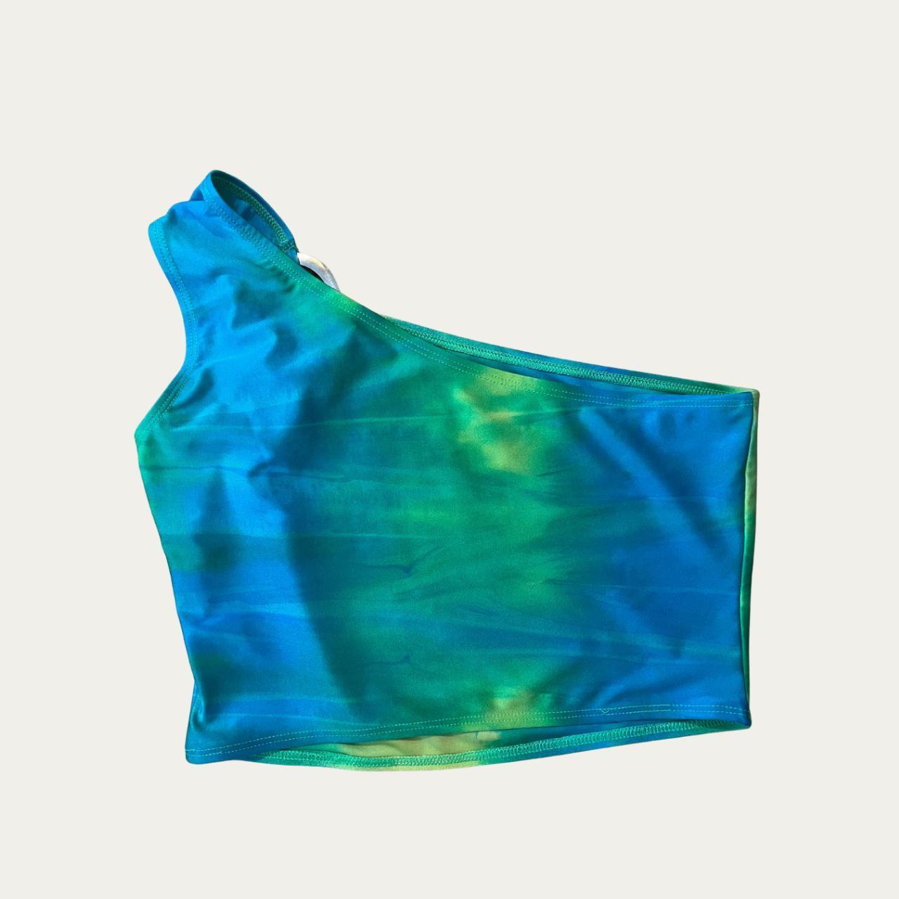 All is A Gentle Spring O-Ring One Shoulder Crop Top.