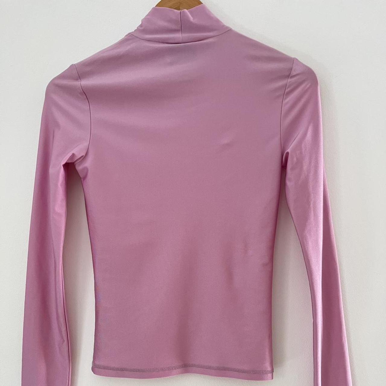 Coperni Tight High Neck Top in Pink.