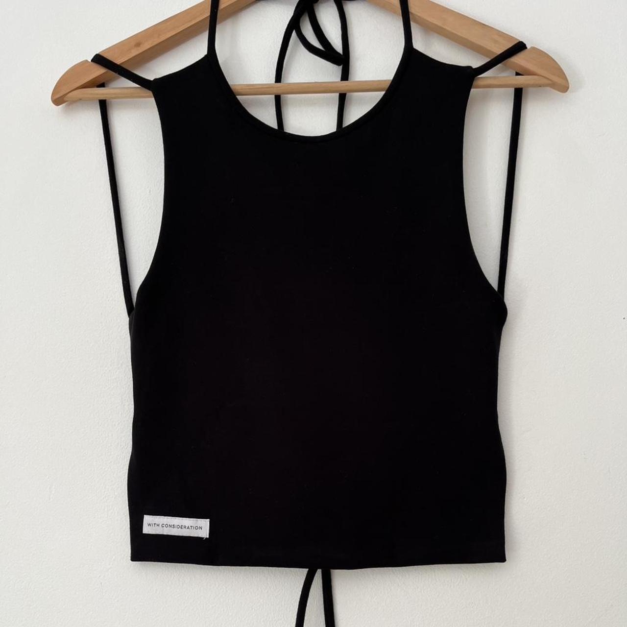 With Consideration Backless Tie Top in Black.