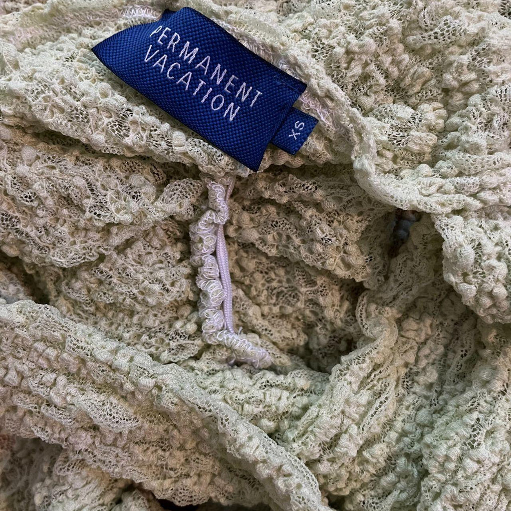 Permanent Vacation ILLUMINATE Lace Halterneck Top in Pistachio.