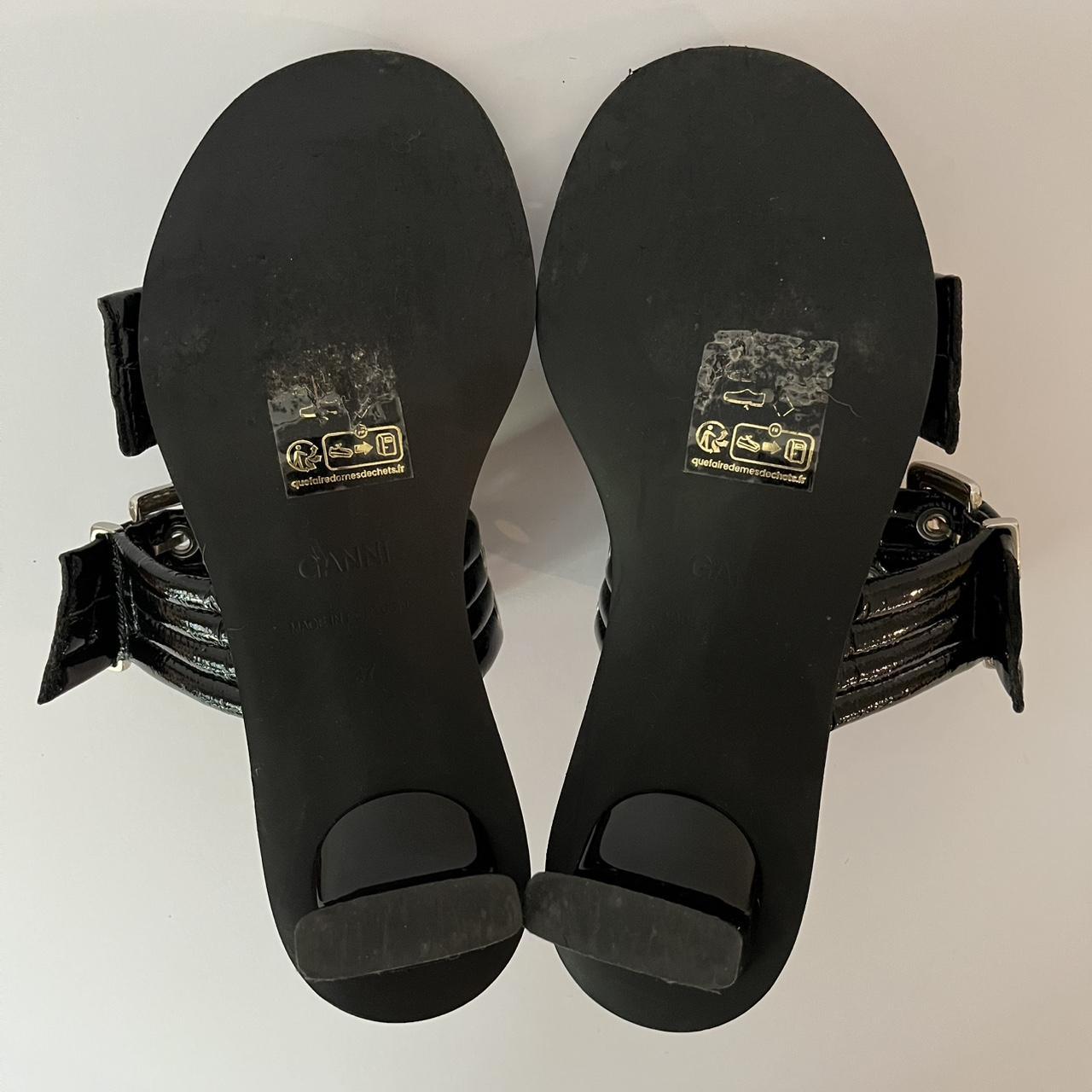 Ganni Leather Buckle Heels in Black.