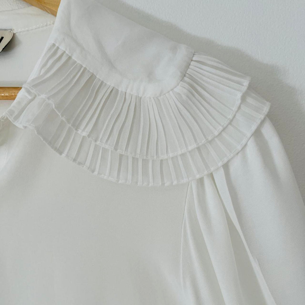 Avavav Ruffle Blouse in White.