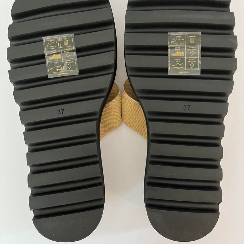 Zulu & Zephyr Thongs in Light Brown.