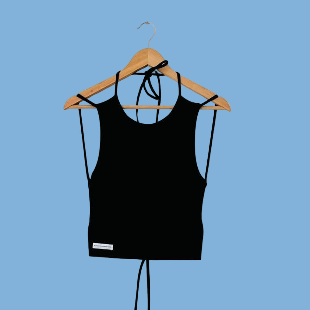 With Consideration Backless Tie Top in Black.